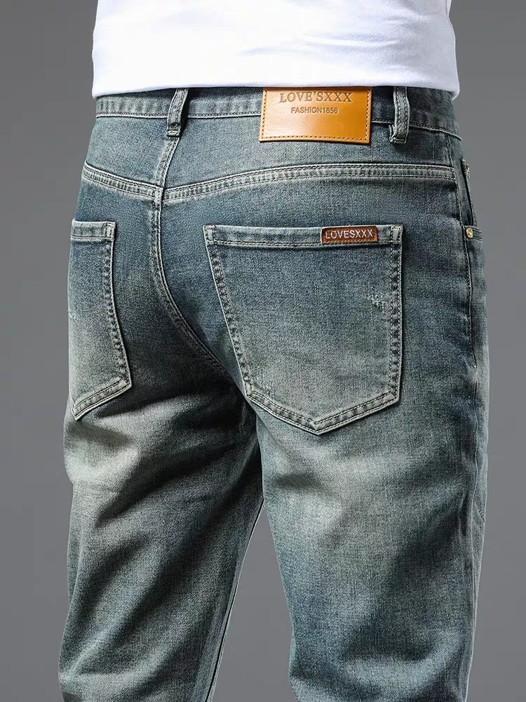 香港高端复古绿色牛仔裤男士夏季薄款修身小脚2024新款休闲长裤子