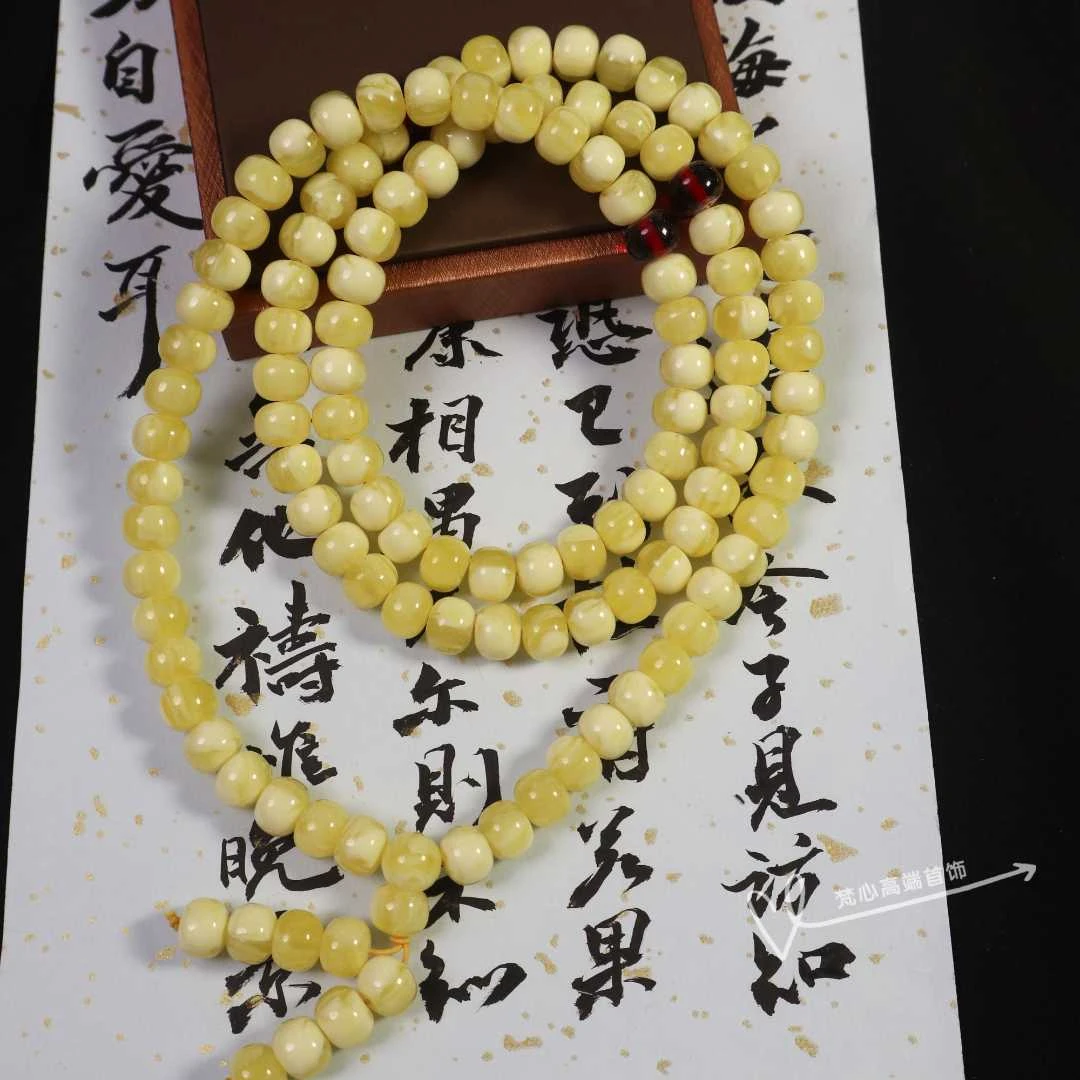 W042 古巴新蜜108算盘珠白花多圈10mm