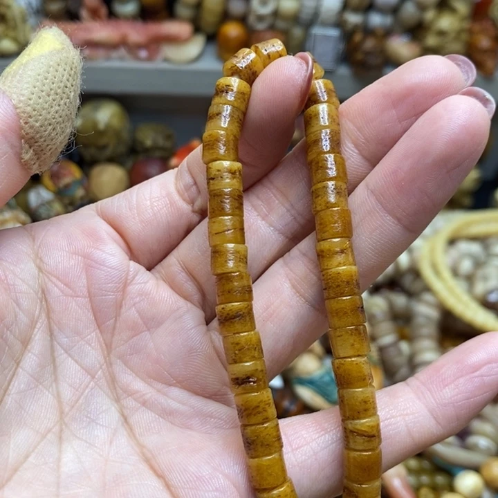 桃核吊坠宝**?驼嘎嘎。