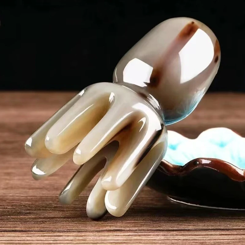 精品牛角八爪鱼按摩头部眼部脸部身体章鱼按摩头皮家用牛角梳子