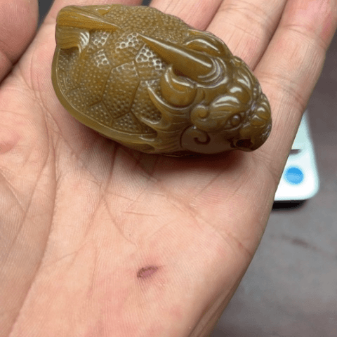 和田玉手把件未镶嵌