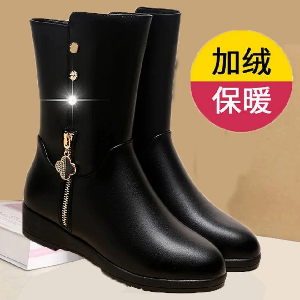 品牌断码真软皮中筒靴女2023冬季新款保暖厚绒防滑防水中年皮靴女
