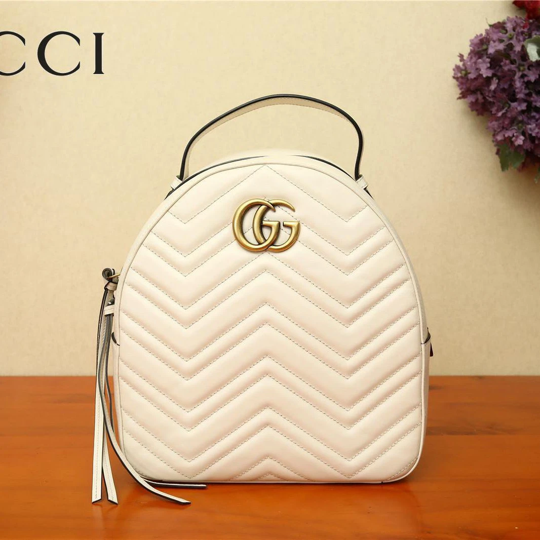 99新  小花6娜 GUCCI GG Marmont 拉链双肩包 白色