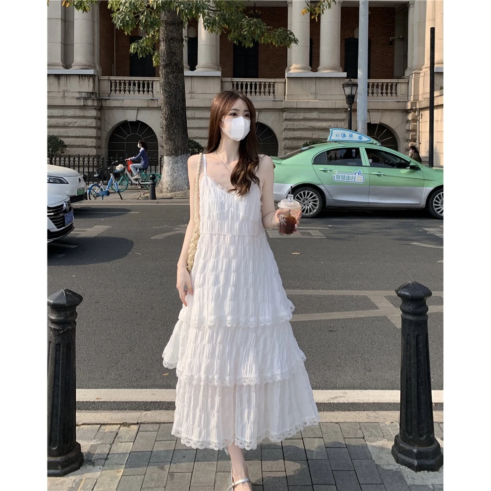 超仙海边度假风沙滩蛋糕裙子法式设计高级感气质显瘦吊带连衣裙女