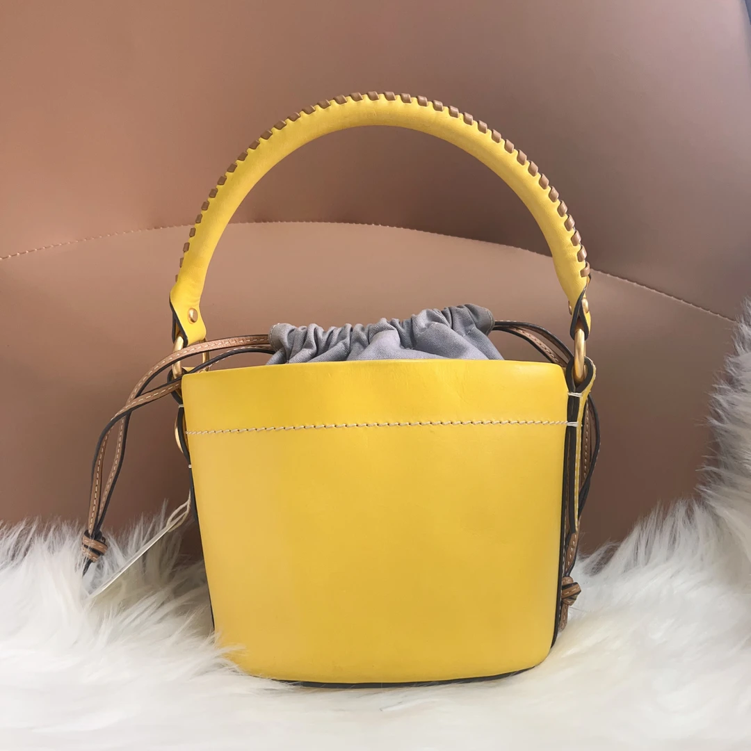 95新 TORY BURCH/汤丽柏琦 汤丽柏琦B0241黄色小水桶包