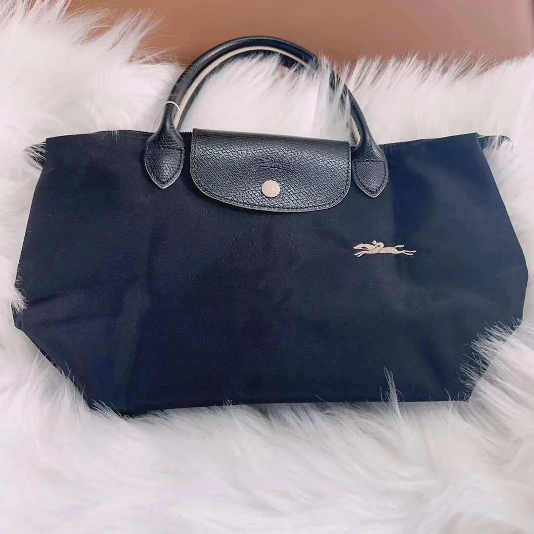 95新  珑骧黑色时尚手提包