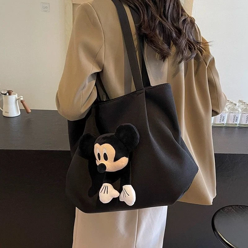 大容量单肩手提通勤托特布包袋女2024新款秋冬米奇卡通大学生DDD