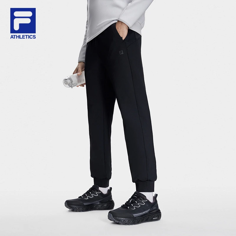 Fila/斐乐男士加绒速干收口裤秋冬保暖黑色弹力长裤A11M341605F
