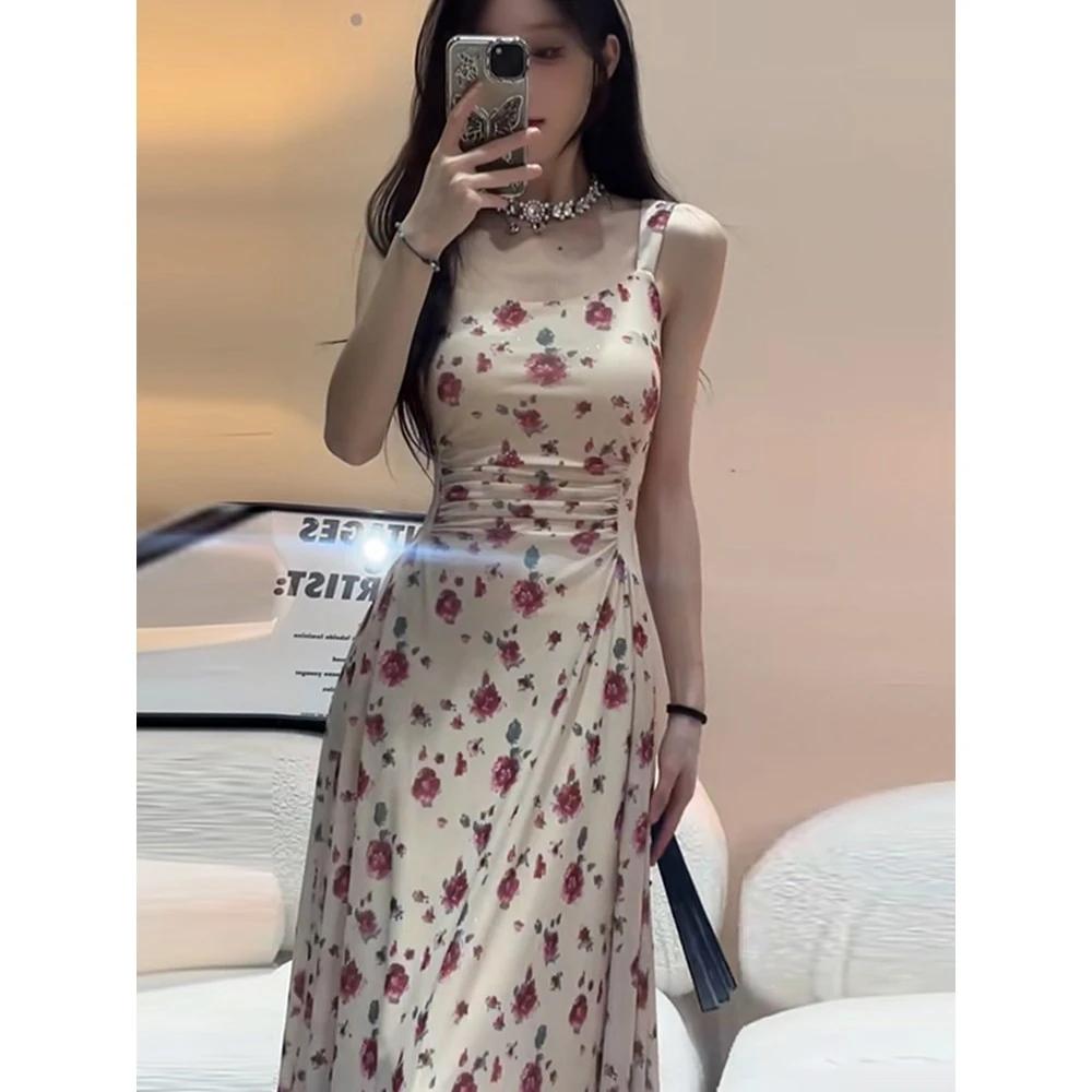 D101设计感风情万种碎花吊带连衣裙子女装2024新款夏季小个子长裙