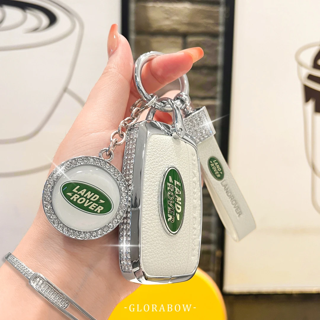 路虎极光钥匙套揽胜发现4运动版5专用女神行者2星脉卫士110真皮扣