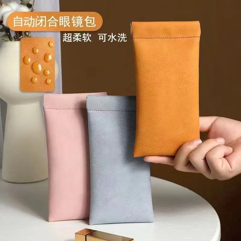 眼镜收纳袋自动闭合化妆品收纳包耳机收纳多功能旅行包