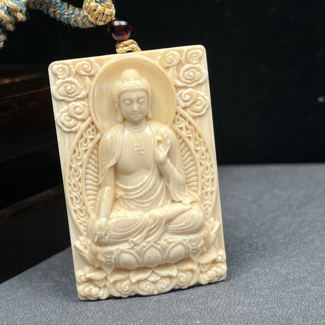 K7858天然猛犸牙 雕刻大日如来 37*58*10mm支持鉴定 假一罚四