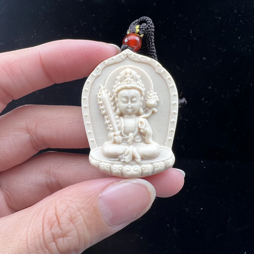 K8109天然猛犸牙 虚空藏雕刻牌 29*40*9mm支持鉴定假一罚四