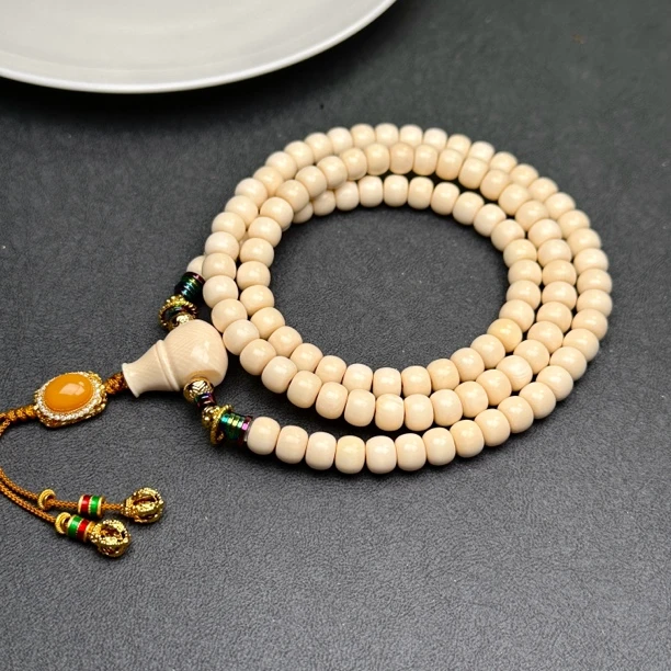 Q1171天然猛犸象牙脖挂 7*5.3mm 支持鉴定假一罚四