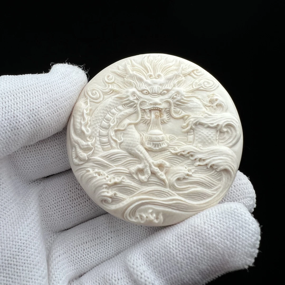 H1914天然猛犸牙 雕刻龙饼 53*14mm支持鉴定 假一罚四