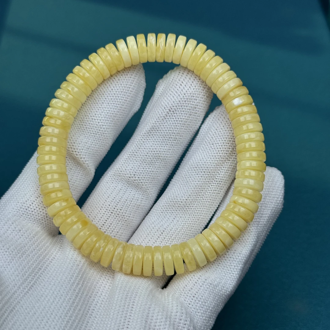 M3801天然原矿蜜蜡 药片单圈 8.5*2.5mm 35克价