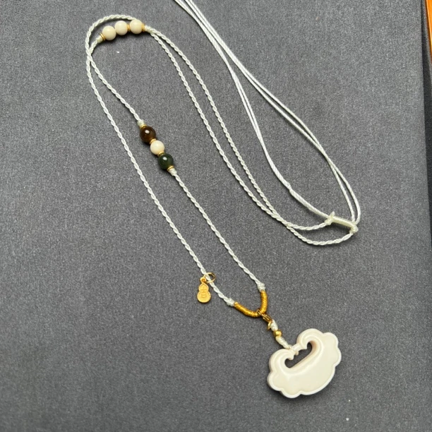 A148天然猛犸牙雕刻 平安锁 28×18×9mm 支持复检 假一罚四