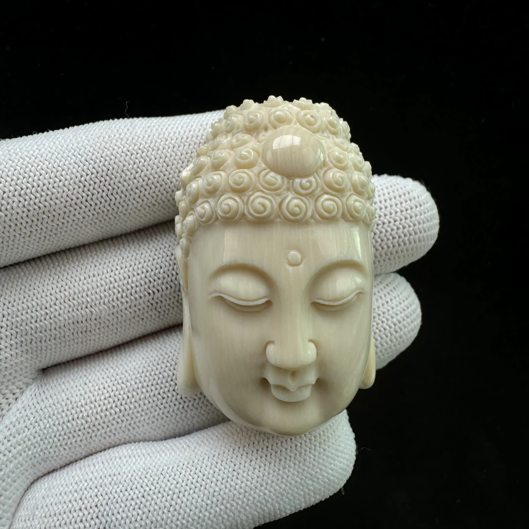 H13-39天然猛犸牙 雕刻大日 34*52*20mm支持鉴定 假一罚四