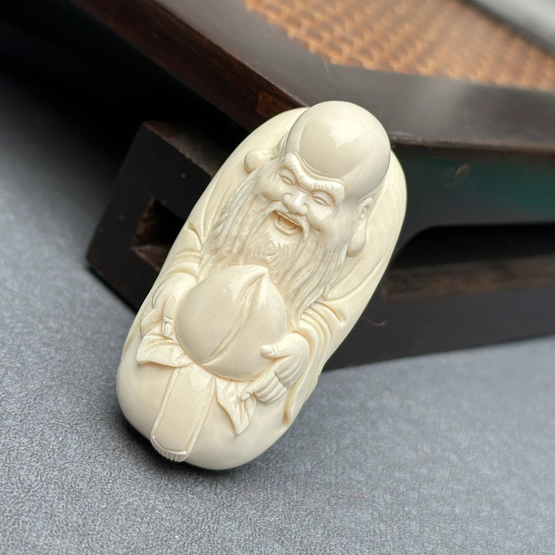 H1424天然猛犸牙 雕刻寿星 28*56*20mm支持鉴定 假一罚四