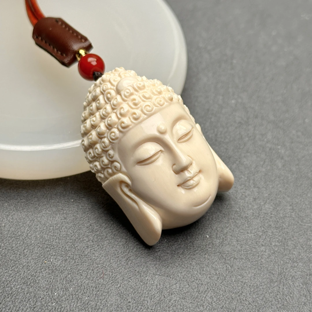 K1046 天然猛犸牙 大日如来 34*49*22mm 支持鉴定假一罚四