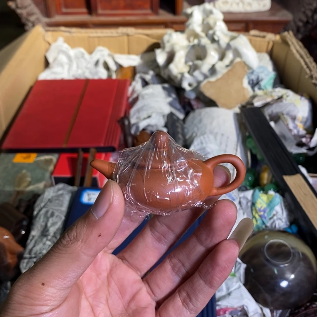 瓷片犹犹豫豫小心翼翼