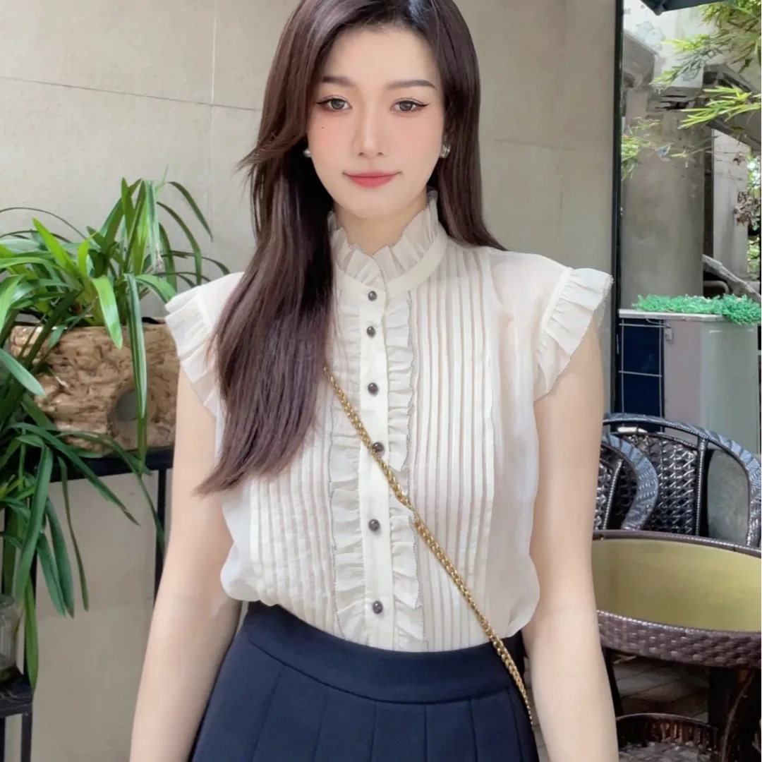 GIRDEAR/哥弟时尚质感百搭优雅木耳边压褶短款无袖衬衫女 1300760