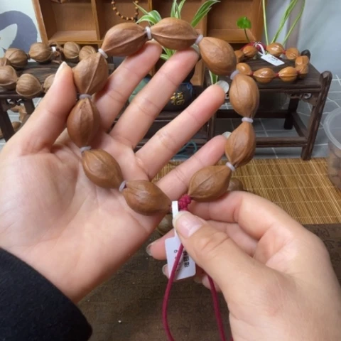 橄榄核核雕梅林铁核18.29