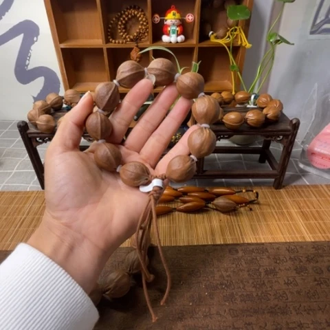 橄榄核核雕小*涂梅林铁核21.26