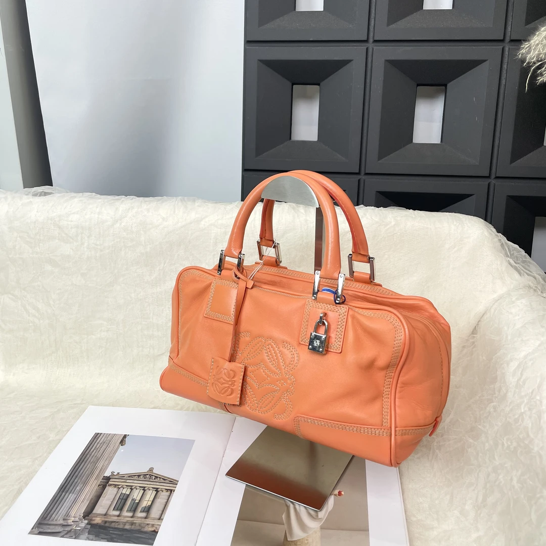 95新 LOEWE/罗意威 亚马逊奶橘色手提包