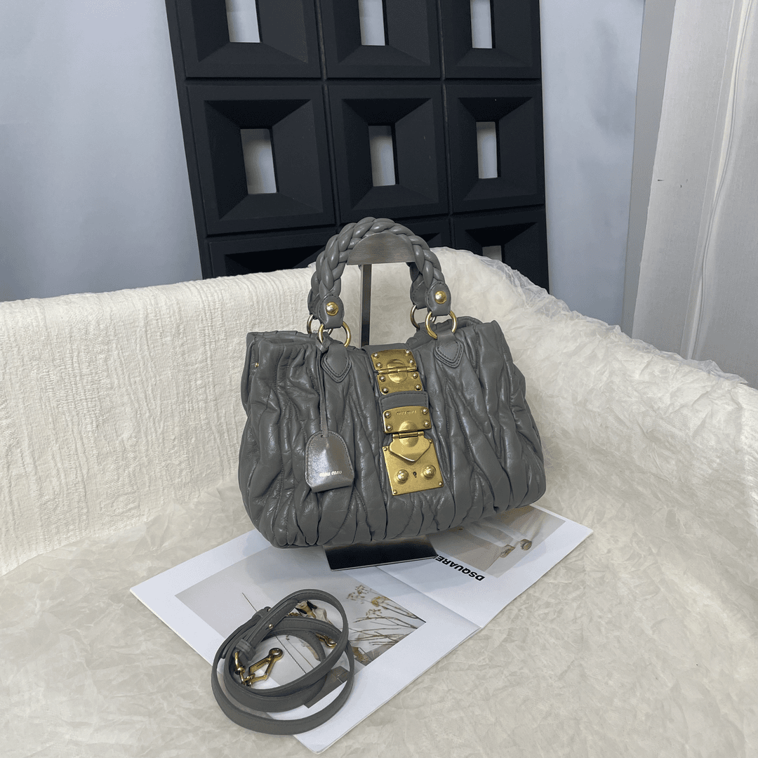 95新 MIU MIU/缪缪 小号大象灰锁头手提斜挎包