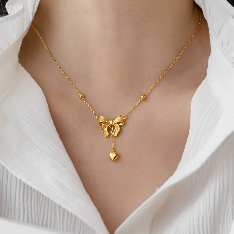钛钢项链 高级轻奢小众蝴蝶结流苏爱心金色项链女锁骨链毛衣链