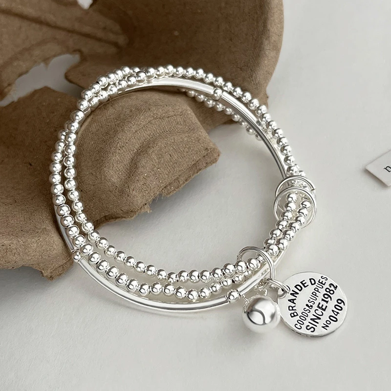 925银手链 925银圆牌珠珠多层手串女ins小众设计感闺蜜叠戴手饰品