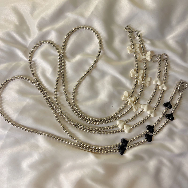 手机斜挎链银色蝴蝶结包包链新款长链金属链包链串珠手绳网红链条