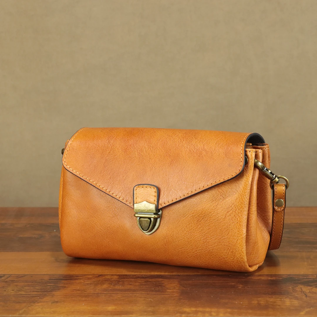 头层植鞣牛皮真皮女士百搭多隔层单肩斜挎简约复古信封风琴包包