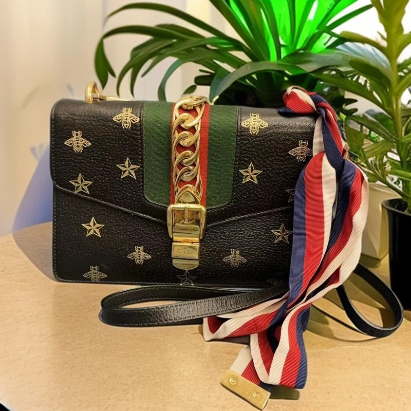 95新 GUCCI/古驰  蜜蜂星星烫金黑手提包  999 8335