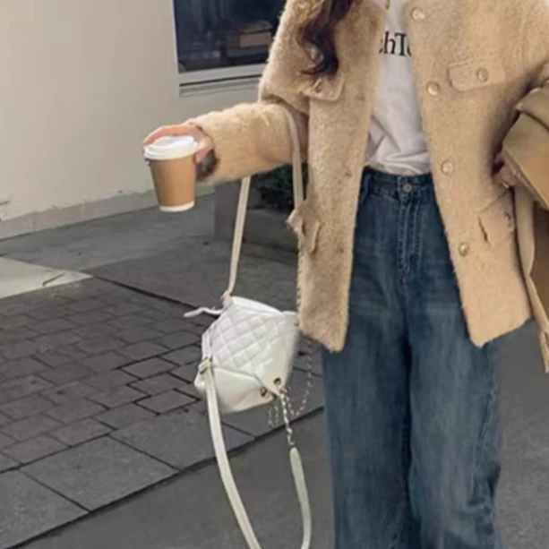 2024春季女生设计师款外套 DTNV233W162771