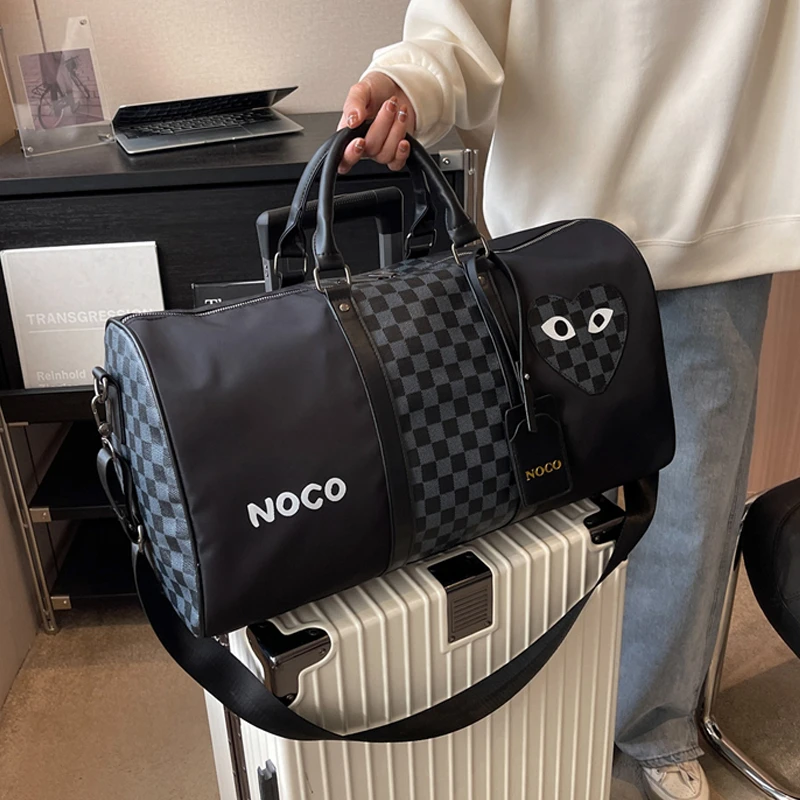 网红新款旅行包欧美手提登机包大容量旅游包男女短途出差行李袋潮