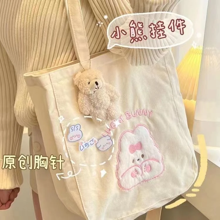 ins潮时尚百搭单肩包女学生韩版帆布包可爱毛绒大容量上课书包袋