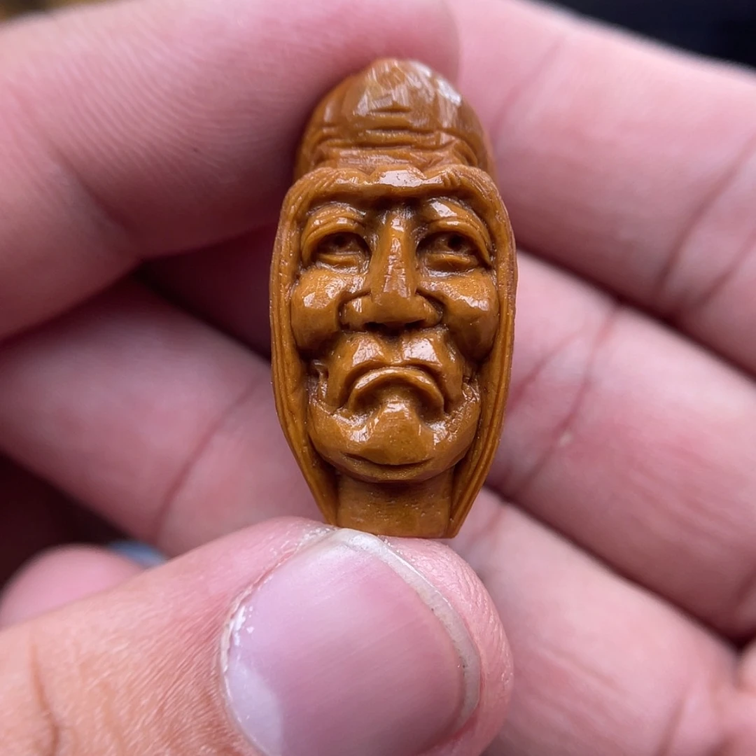 【闪购商品】橄榄核吊坠天***呵