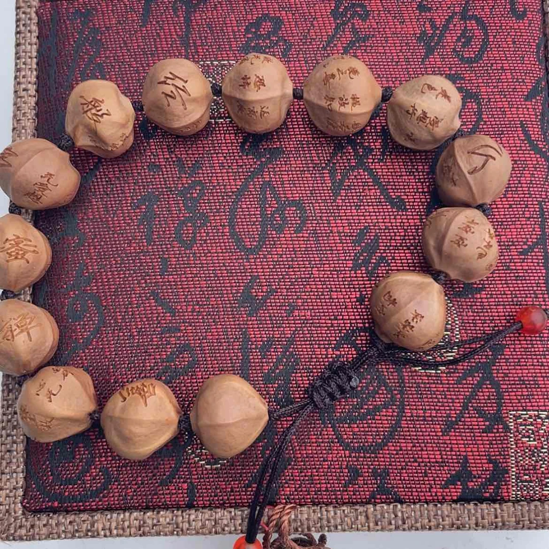 【闪购商品】橄榄核吊坠简****单