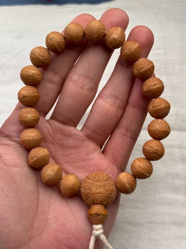 12.5mm实心籽粉红皮尼泊尔凤眼菩提手串