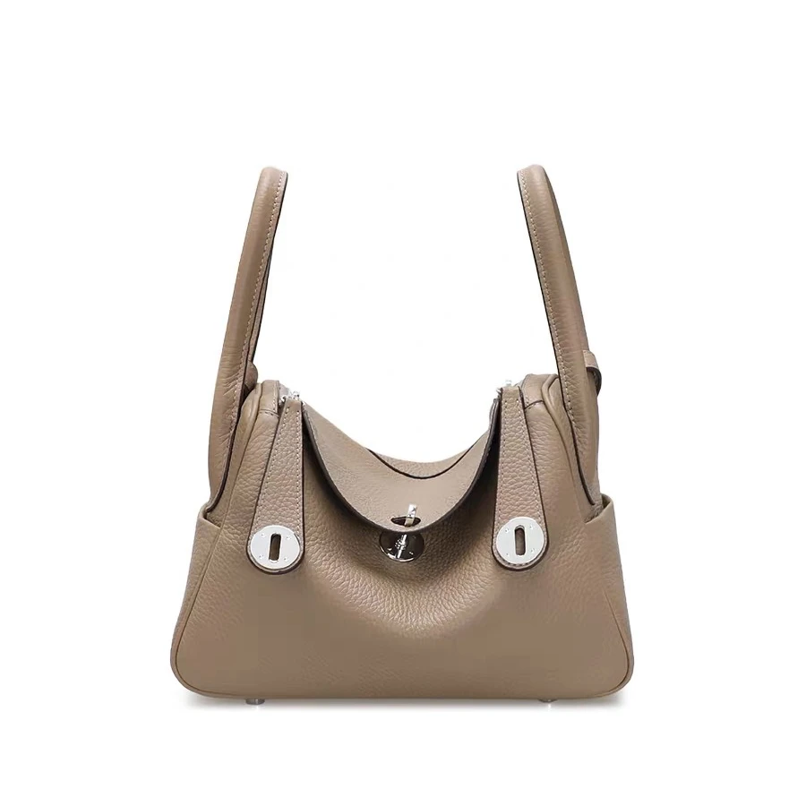 相约浪漫2023新款琳迪包牛皮真皮女包潮单肩斜跨手提枕头包时尚