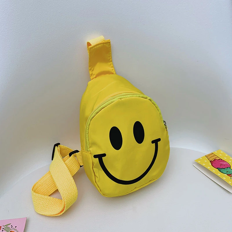 韩版可爱简约时尚笑脸小胸包便携男女童卡通斜挎包运动户外小潮包