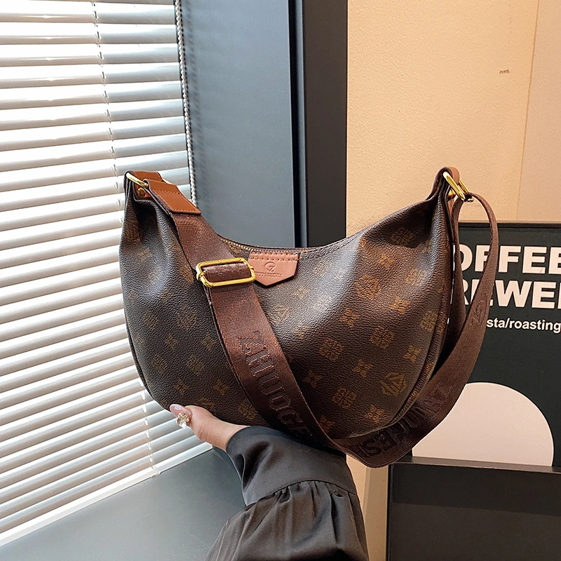 网红包包女2025新款时尚印花大容量饺子包高级感宽肩带单肩斜挎包