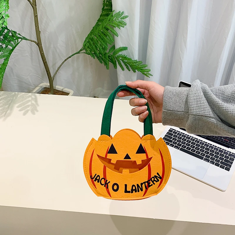 万圣节手持鬼脸手提袋布艺小南瓜糖果礼包幼儿园儿童礼物混合糖果