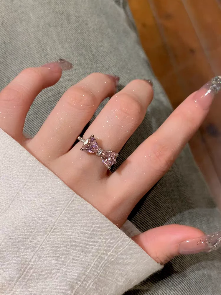 钛钢合成锆石戒指 蝴蝶结戒指女小众设计感粉色时尚可调节指环