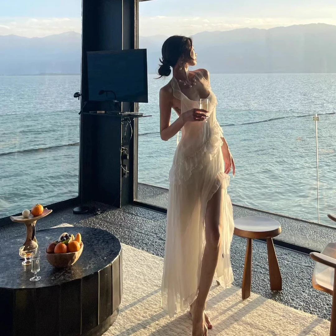 法式纯欲氛围感挂脖吊带连衣裙女海边度假沙滩裙荷叶边露背长裙子