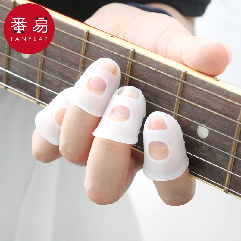 w59吉他指套 护手防痛左手尤克里里硅胶弹吉他配件护指尖手指