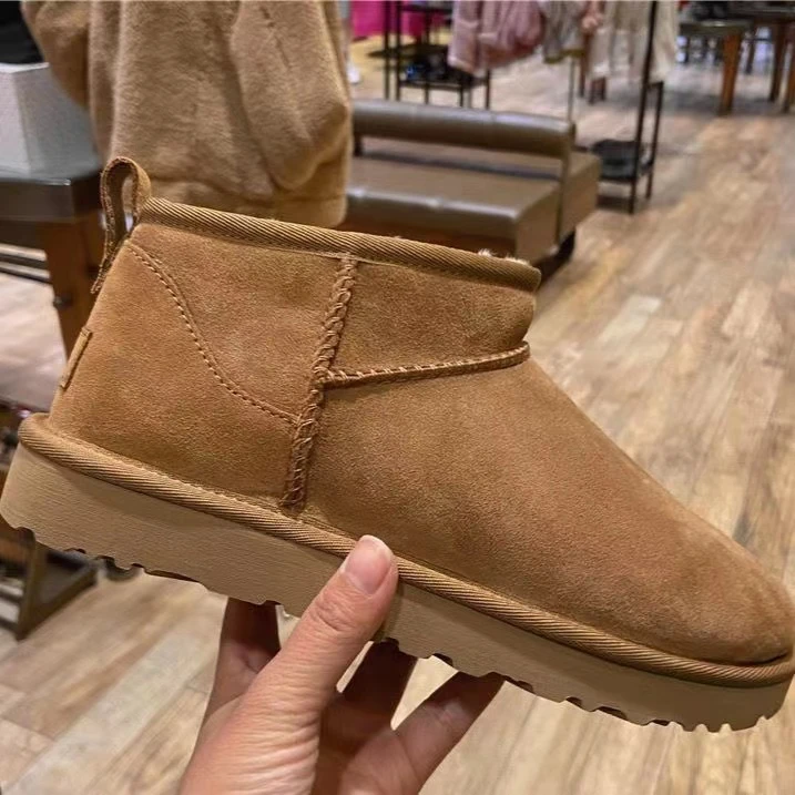 周冬雨mini同款真皮雪地靴女2023冬新款情侣短靴加绒加厚棉鞋爆款