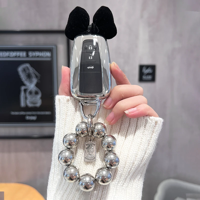 适用丰田卡罗拉钥匙套凯美瑞雷凌亚洲龙荣放rav4汉兰达霸道壳包扣